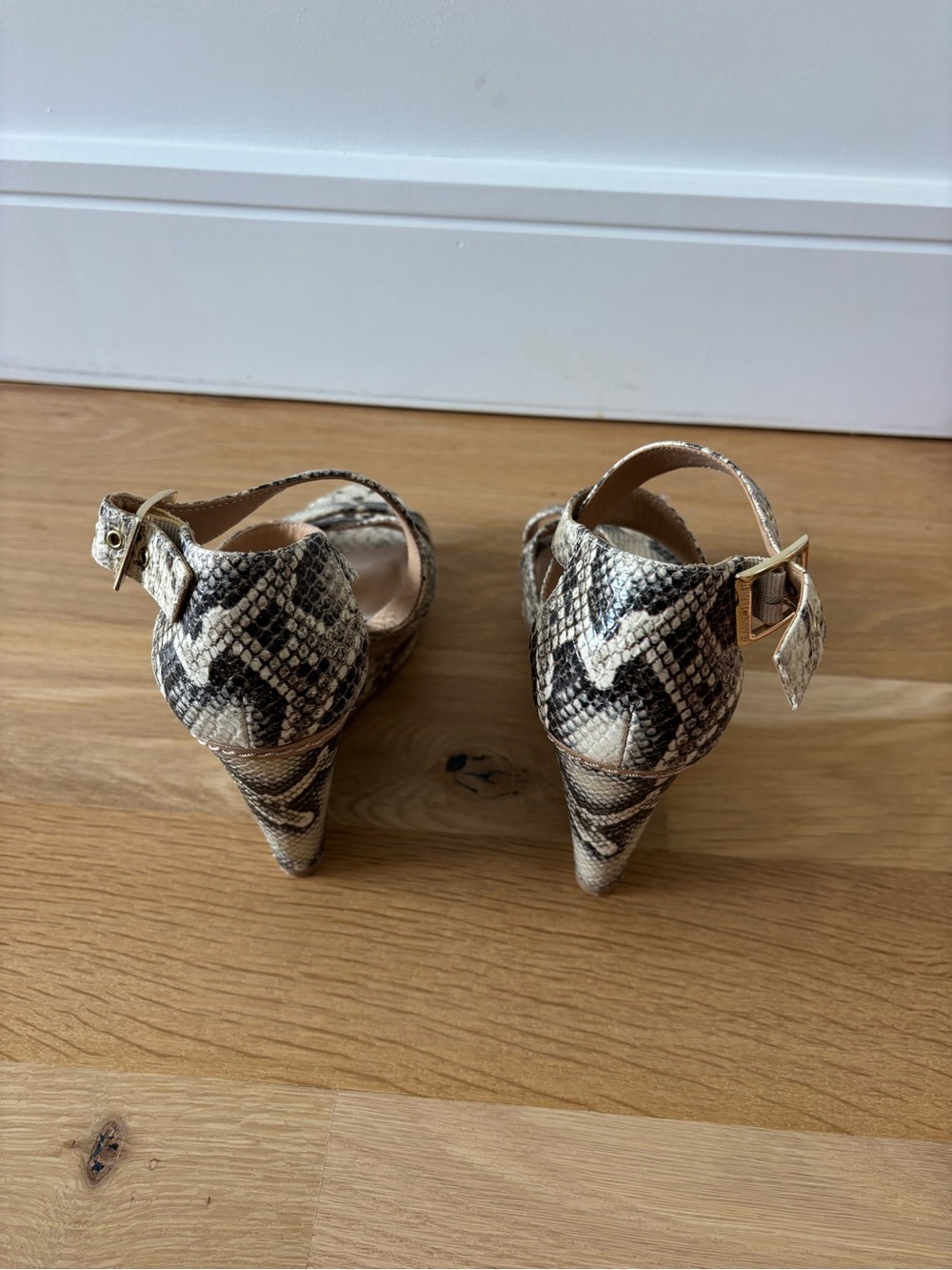 Elaine Turner Snake-Print Ankle-Strap Heels in Beige and Black with Gold Buckles